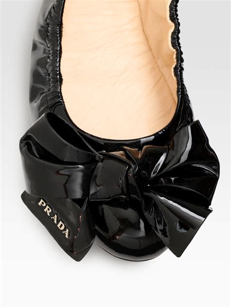 prada bows|Prada flat shoes with bow.